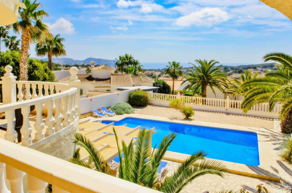 Views over the pool to the sea from Villa Felipa