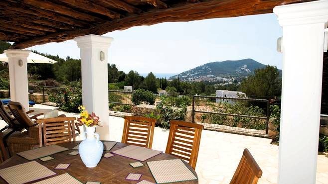 The shaded dining area at Villa Casa Can Maderus on Ibiza