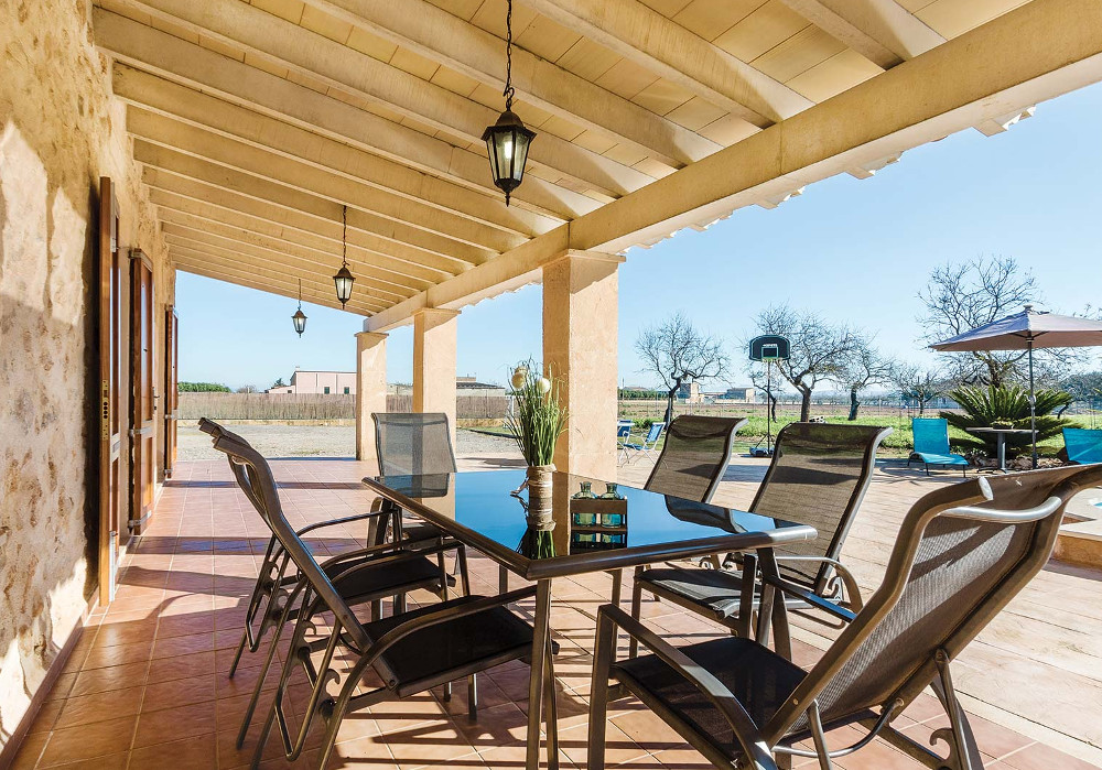 The shaded dining area at Villa Capo on Majorca